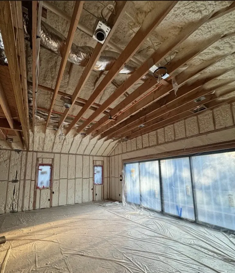 Interior walls and ceiling insulated with spray foam during new construction in South Fayette